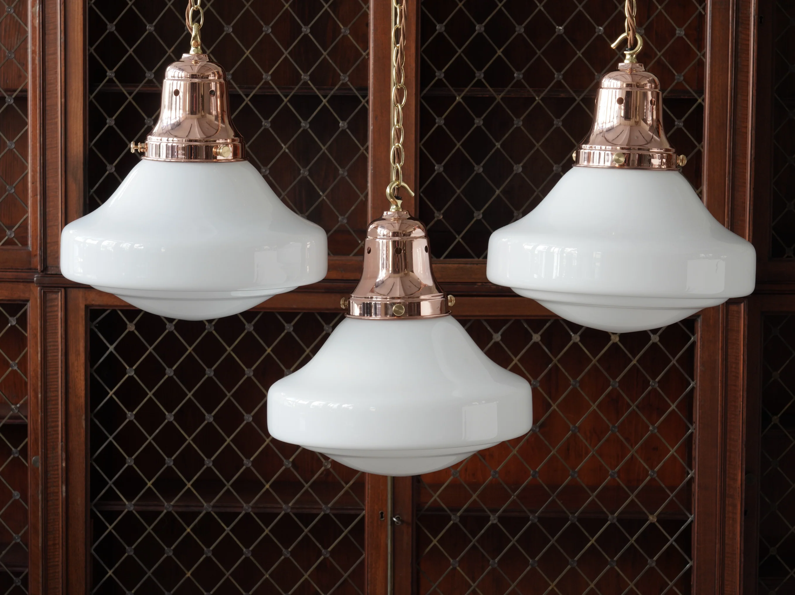 The Ellis Opaline Glass Pendant in Polished Copper