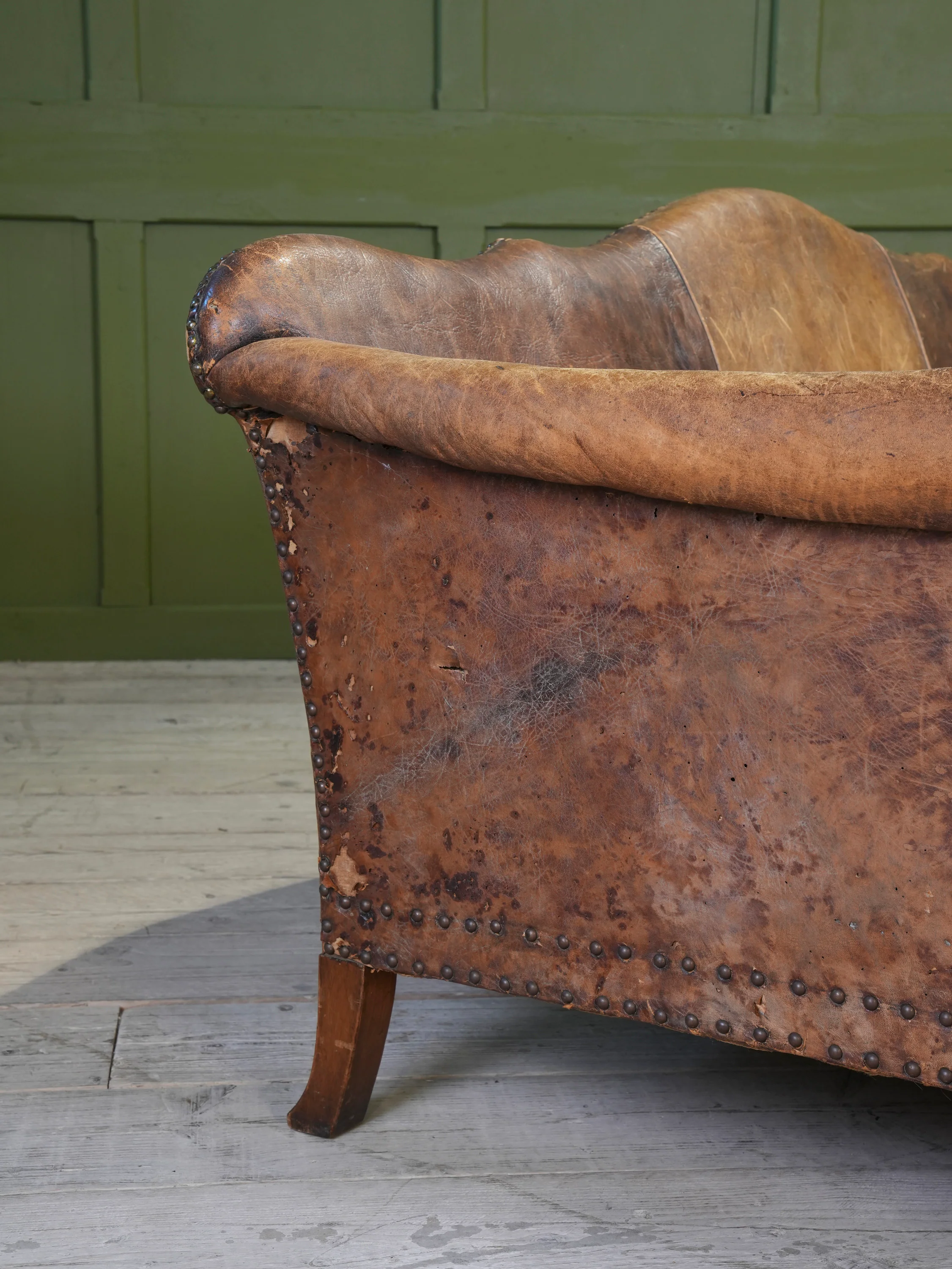 A Large Leather Camelback Sofa - Image 15