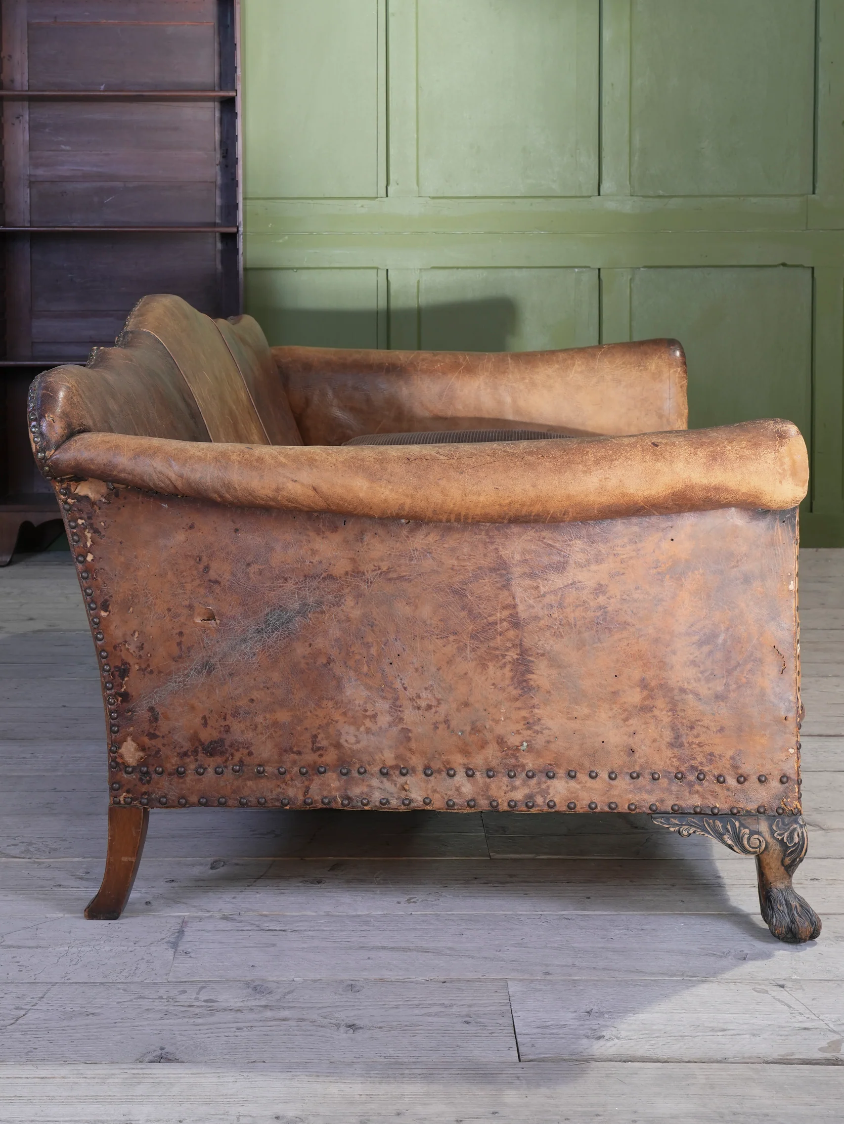 A Large Leather Camelback Sofa - Image 19