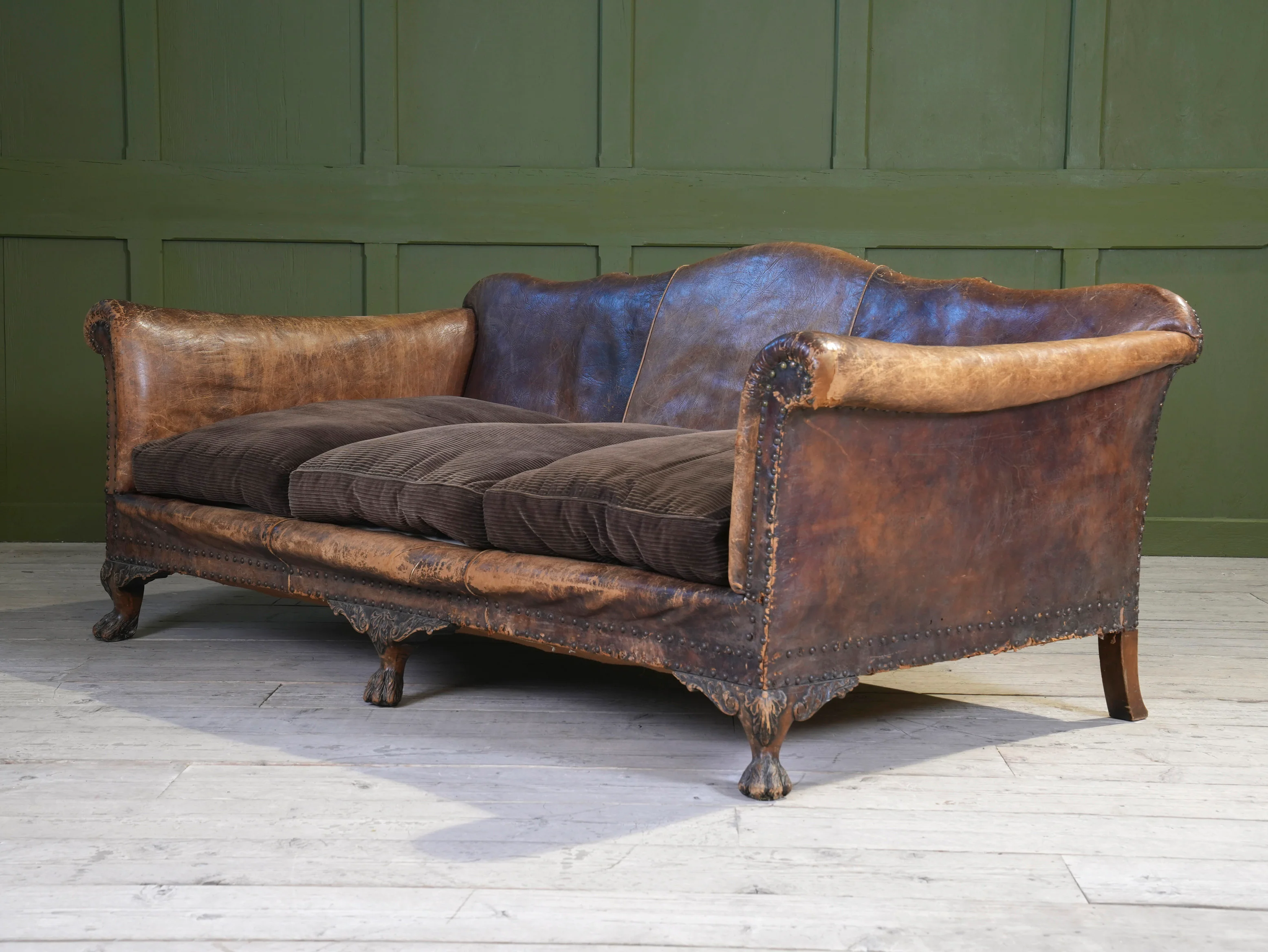 A Large Leather Camelback Sofa - Image 4