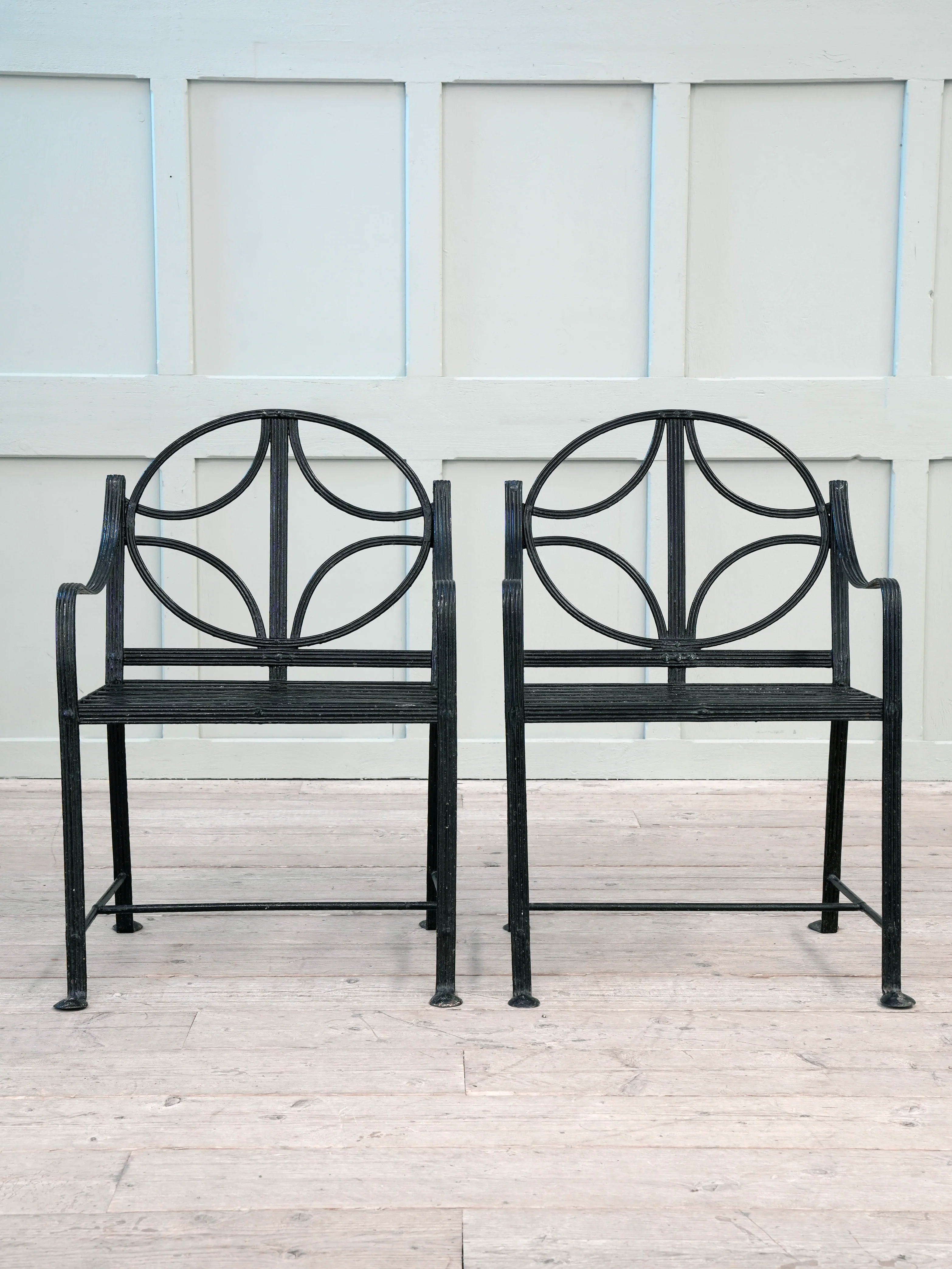 A Pair of Regency Wrought Iron Garden Chairs